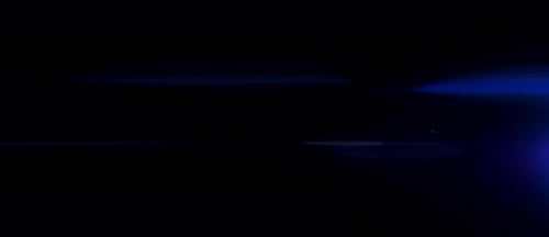 Radium Collection: Sharp lens flare effect with a blue hue rising from the right