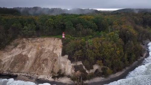 Scenic Coastline with Cliff Erosion and Lighthouse
