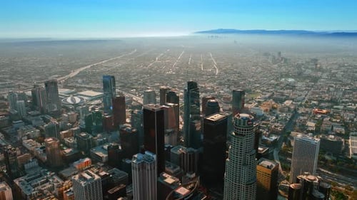 Slow descending above the midtown of vibrant Los Angeles, California, US.