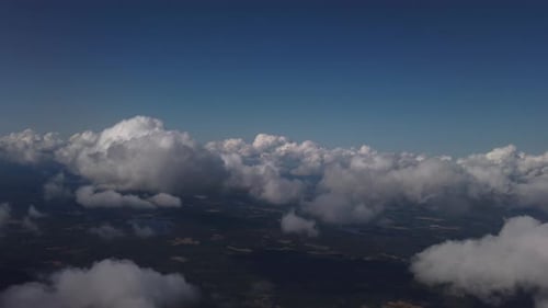 Aerial View of White Clouds Drifting