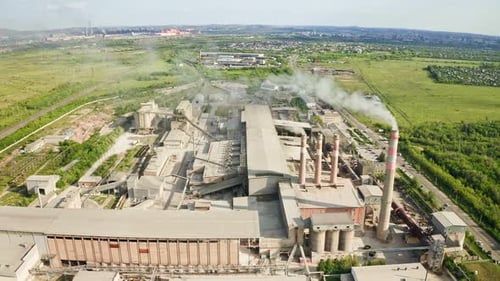 Aerial View of Factory Chimneys Contributing to Air Pollution