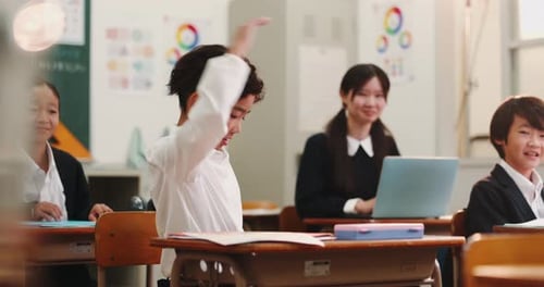 Enthusiastic Student Answering Question in Classroom