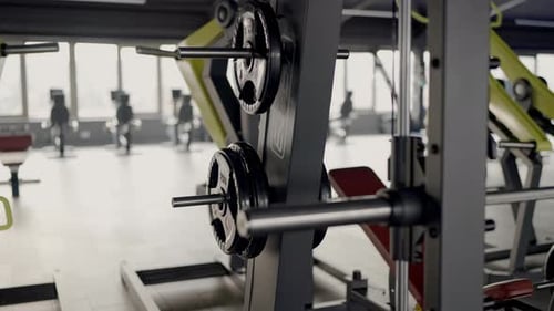 Professional Gym Interior with Equipment in Focus
