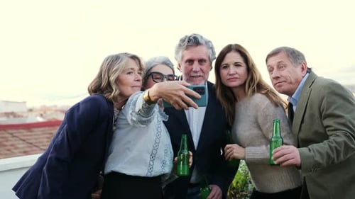 Friends Take a Photo With Beer Bottles