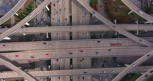 Aerial View of Multi Level Highway Interchange with Flowing Traffic