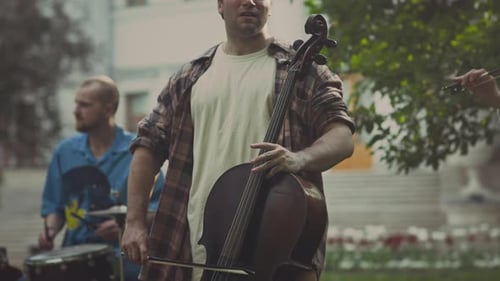 Musicians Play Together in an Urban Park