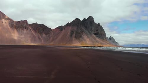 Majestic Icelandic Scenery Stokksnes in Iceland Black Sand Beach Drone View