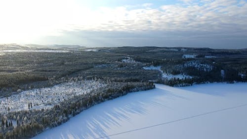 Aerial over a frozen winter landscape
