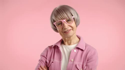 Fashionable Elderly Lady in Pink Exuding Confidence and Charm Camera 8K