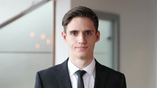 Shaking Head to Reject Businessman in Office