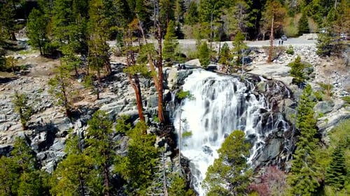 Aerial View of a Beautiful Filled Waterfall From Stone Mountains By the Road