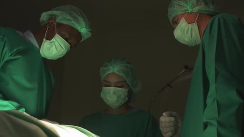 Surgeons Performing Critical Operation in Hospital Operating Room