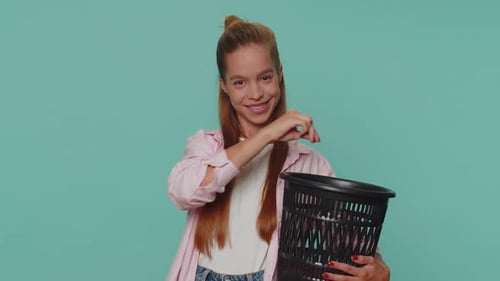 Girl Holding Trashcan Thumbs Up Approval