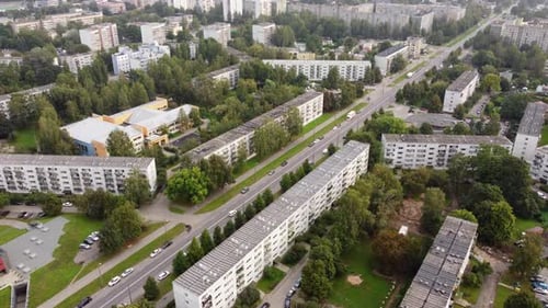 Urban area with streets and multi-story apartment buildings, aerial view