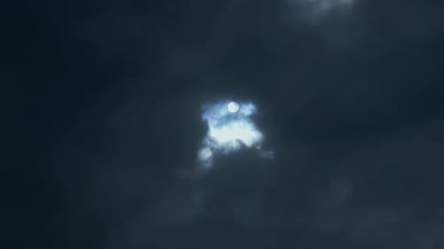 Brooding Sky with Light Peeking Through Clouds