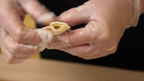 102pz. Pies are made from puff pastry and meat. Preparation of meat pies from puff pastry.