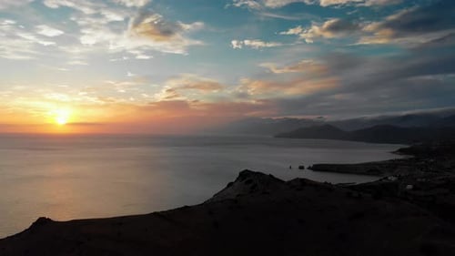Seascape and mountain landscape