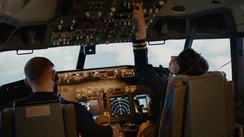 Team of Aviators Throttling Power Engine and Fixing Altitude Level