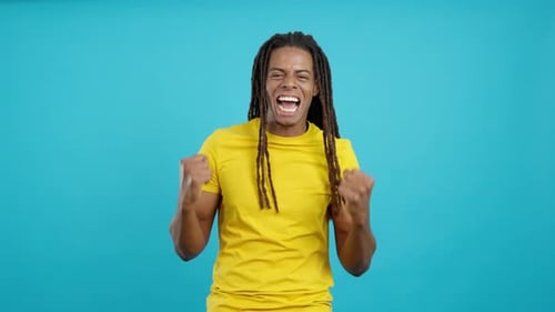 Excited Man Celebrating and Cheering Success