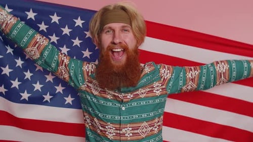 Man Waving American Flag on Pink Background