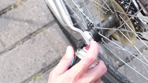 Applying Oil on Mountain Bike Chain Man Hands Lubing Bicycle Chain Technical Expertise Taking Care