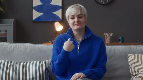 Woman Signing the Alphabet Using Sign Language