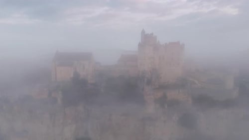Aerial view of the castle in the fog, France.