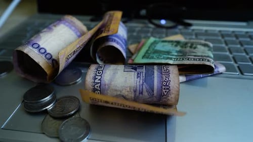 Money on Computer Keyboard