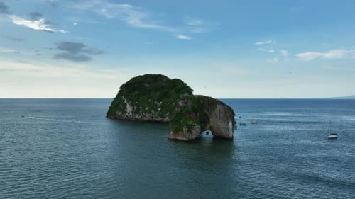 Aerial view around the Mismalyoa arches in partly sunny Puerto Vallarta, Mexico