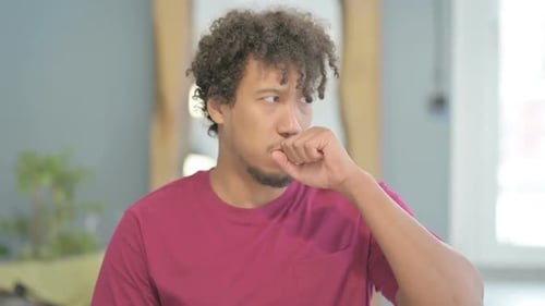 Person Coughing Touching Chest Indoors