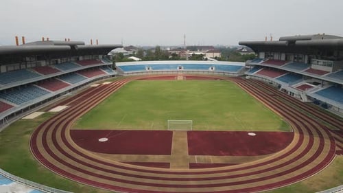 Aerial drone shot of a turf net in around soccer field