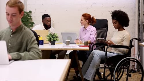 Multiracial team working together in modern office