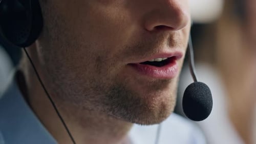 Closeup Mouth Talking Microphone in Call Center. Sales Representative Speaking Consulting Client