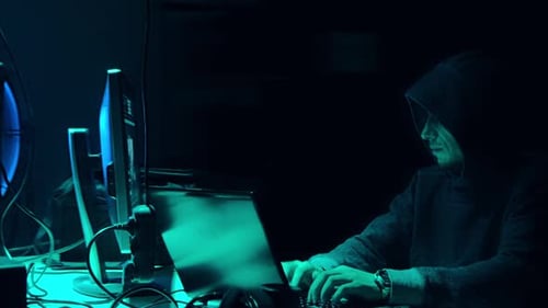 Wanted Hackers Coding Virus Ransomware Using Laptops and Computers in the Basement Cyber Attack