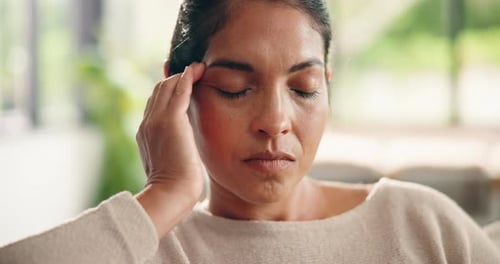 Headache, tired and stress with woman in home for frustrated, fatigue and brain fog