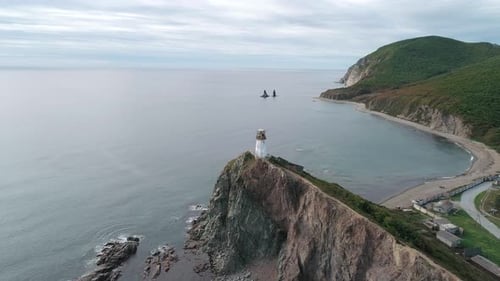 Aerial View of an Old Lighthouse on the Cliff on Pacific Coast Beautiful Panoramic Seascape
