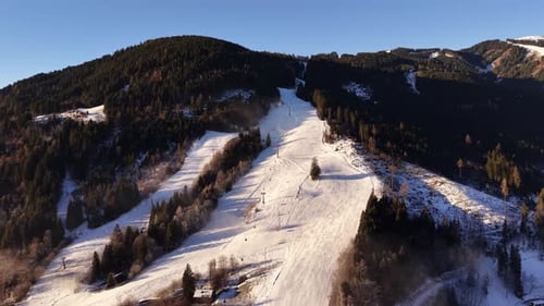 Scenic Aerial View of Snowy Mountain Ski Resort