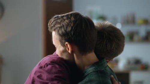 Affectionate Couple Tenderly Embrace Indoors