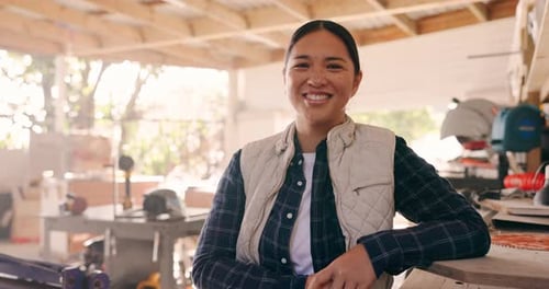 Tools, smile and face of woman in workshop for manufacturing, carpenter and furniture