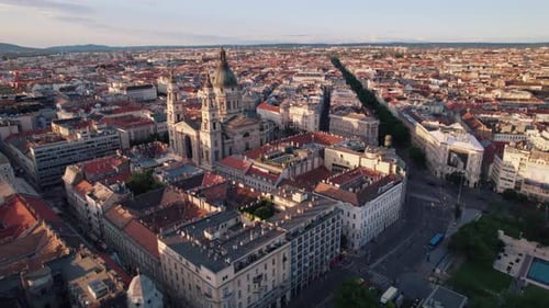 Aerial panorama of Budapest highlighting St. Stephen’s Basilica at sunset