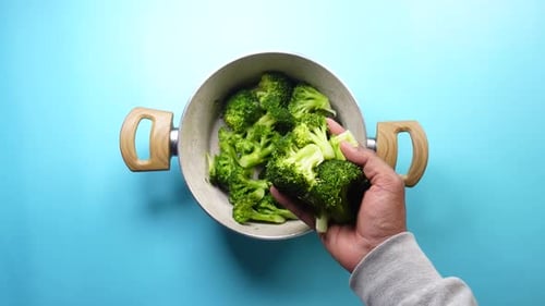Preparation of Fresh Broccoli in a Contemporary Kitchen Environment for Delicious Meals