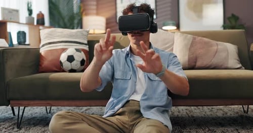 Young Adult Experiencing Immersive Virtual Reality at Home