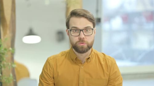 Excited Man Celebrating Success in the Office