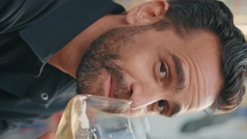 Vertical Portrait Hot Macho Drinking Wineglass at Street Bar Happy Smiling Man