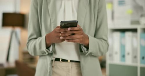 Woman, phone and hands typing or walking at office for social media, communication or networking