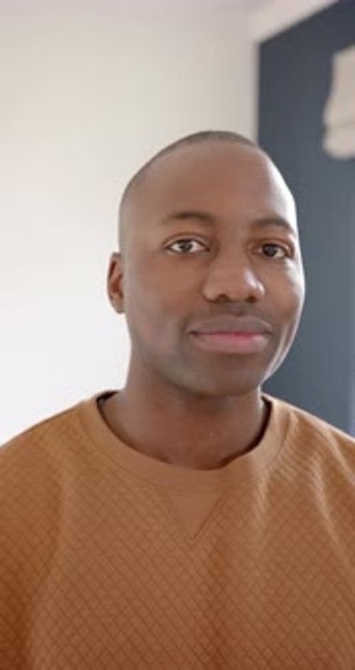 Young Man Smiling Close Up with a Bright Smile