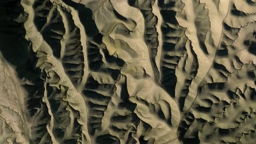 Desolate Sand Dunes With Erosion Cracks In Utah, USA. aerial top-down