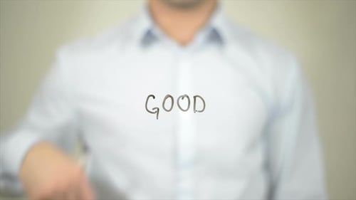 Writing the Word Good on Transparent Surface