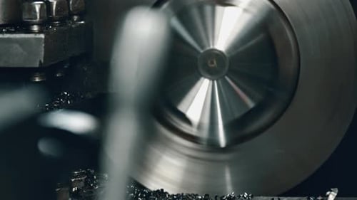 Metal cutting lathe machine in industrial workshop
