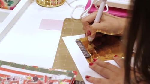 Crafting Foil Art with Tool on White Paper